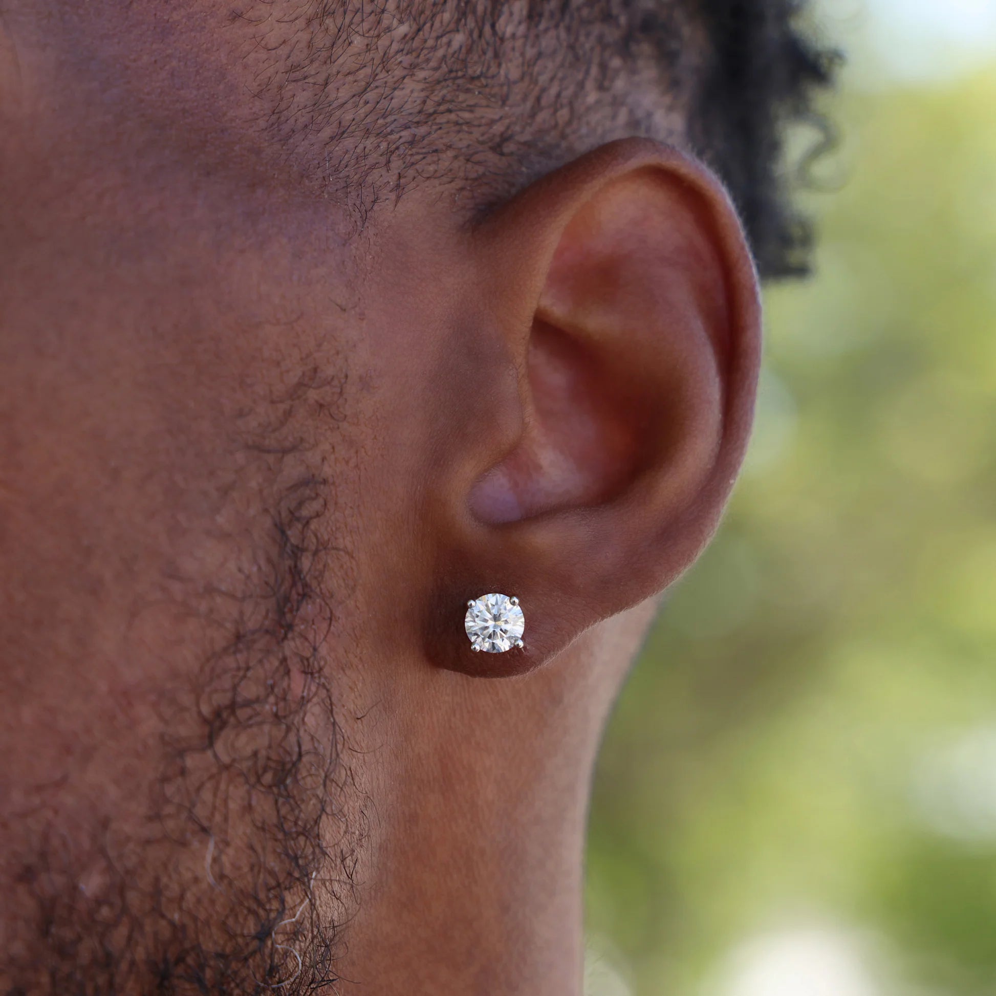Round Cut Moissanite Stud Earrings in White Gold